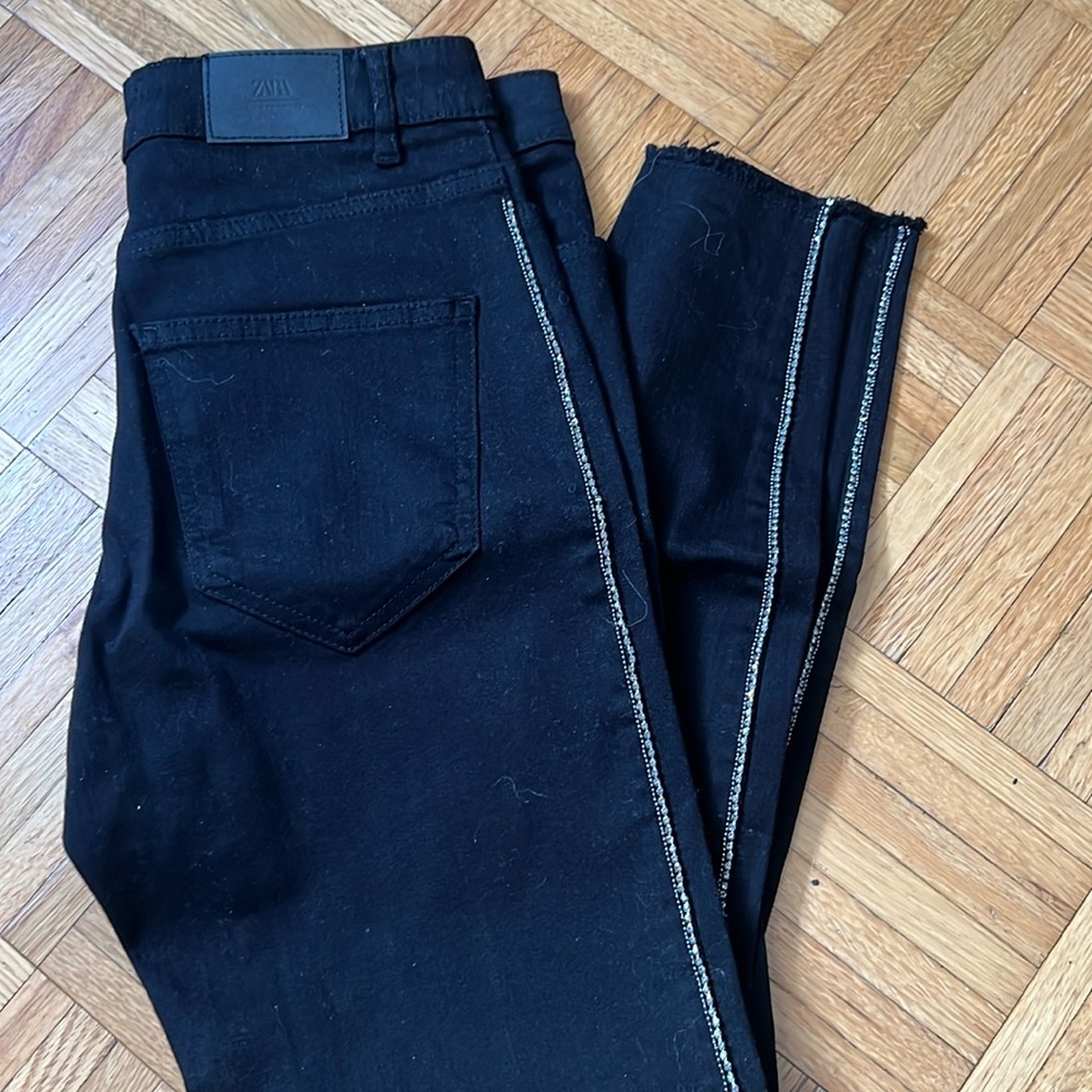 Black high waisted skinny jeans with rhinestones down the leg